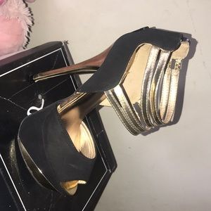 Gold and black heels